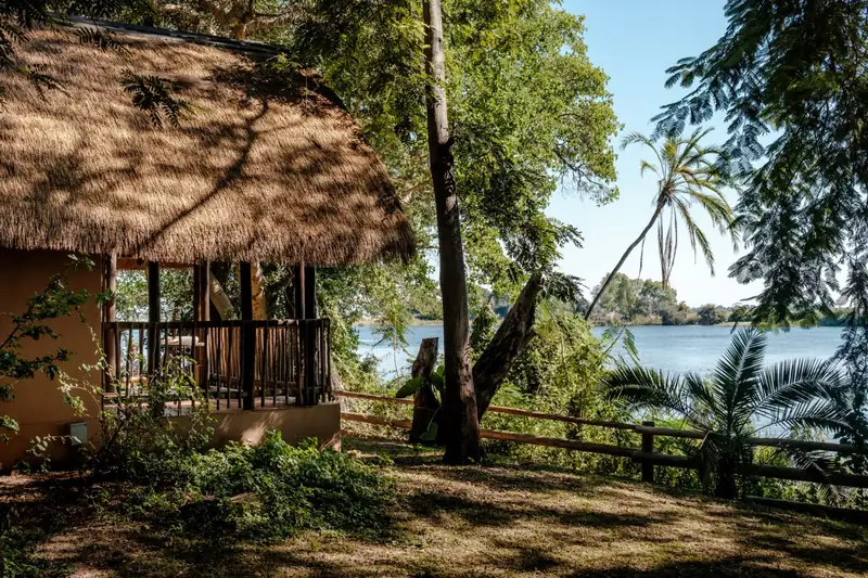 A thatched riverside chalet